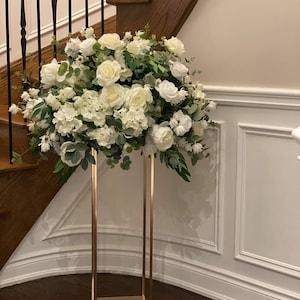 Stunning wedding centerpieces with magnolias, hydrangeas, roses and eucalyptus/wedding flowers/centerpieces/bridal flowers/bouquets