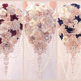 Rose gold blush pink blue burgundy cascading teardrop brooch bouquet.