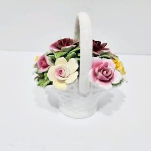 Royal Stratford  basket bouquet ornament, England, beautiful roses  in pinks and yellows, white basket