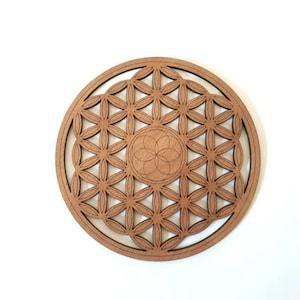 Handcrafted flower of life in laser cut wood with seed of life engraving, stone and jewelry refill, customizable.