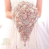 Extra long luxury pearl rose gold teardrop brooch bouquet.