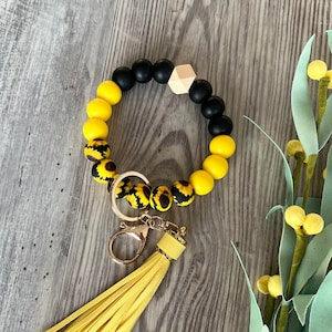 Sunflower Silicone & Wooden beads wristlet keychain, with yellow tassel and gold lobster clasp