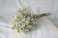 Small flower girl bouquet made simply with gypsophila and tanacetum. Finished with burlap and twine Flower Delivery