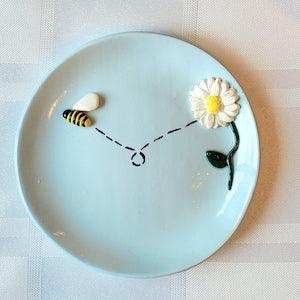 Handmade polymer clay trinket dish with bee and flower