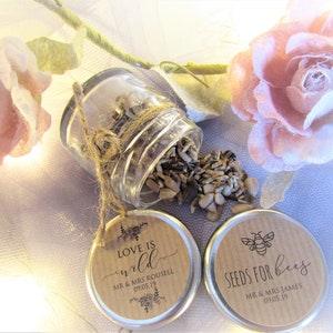 Wild flower Seed wedding favours, personalised with names and 'Seeds for bees' or 'love is wild' in recycled jars. Ecofriendly & zero waste