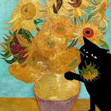 cat and van gogh's sunflowers, cat eating flowers, bad cat, cat sick afterwards, black cat, cat eating plants