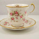 Paragon  "Victoriana  Rose"  Pattern Tea Cup and Saucer.   Paragon Company  Made in England By appointment to HRH The Queen