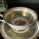 Vintage Gorgeous Paragon Teacup and Saucer, Green with Heavy Gold, floral pattern in the centre, Rose with bouquet of flowers,stunning