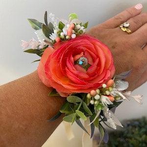 Ladies Floral Artificial Faux Apricot/Pink Ranunculus Wrist Corsage, with presentation box.