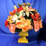 Lovely Floral Arrangement  In Shades of Coral Pink & Yellow in a Square Planter