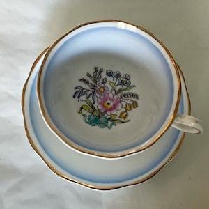 Royal Albert cup and saucer, floral bouquet and blue bow, 1940s - 50s