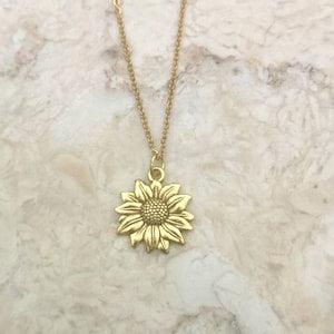 Gold Sunflower charm on a gold stainless steel chain 18 inches