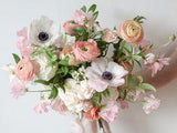 spring bridal bouquet in peach, blush, and white Flower Delivery