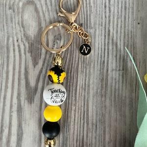 Teaching is a Work of Heart Sunflower beadable keychain, with initial charm