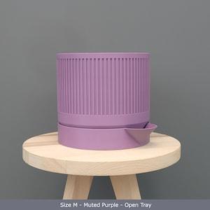 Large Flower or Planter Pot with Self-Watering for Easy Plant Care, Modern Design in Muted Purple, Perfect for Home Decor and Gift Giving.
