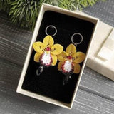 Black and yellow, orchid earrings, warm yellow jewelry, yellow earrings, drop earrings, floral jewelry, tropical jewelry