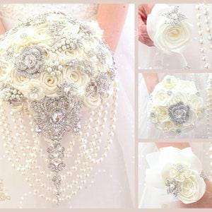 Classic wedding bouquet. White wedding bouquet. Winter bouquet. Silver jeweled bridal bouquet. Pearl cascade bouquet.