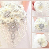 Classic wedding bouquet. White wedding bouquet. Winter bouquet. Silver jeweled bridal bouquet. Pearl cascade bouquet.