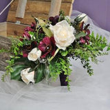 Bride bouquet for a boho wedding  made with fern,  creamy white roses and burgundy coreopsis. Groom's boutonniere included