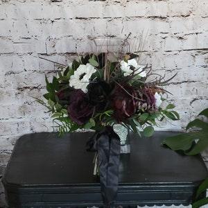 Boho Brides Wedding Bouquet with Eggplant, black and white. Peonies, roses, cabbage roses, anemones and magnolias
