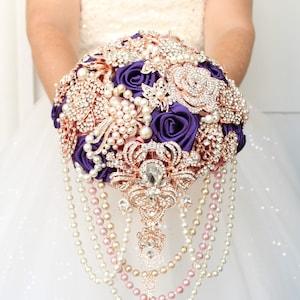 Royal purple brooch bouquet. Rose gold cascading glamour plum wedding bouquet