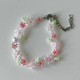 dainty flower beaded bracelet | pastel pink and red daisies