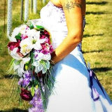 wedding overhanging bouquet roses and lilies