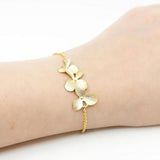 Gold-plated bracelet, blossoms, orchids, flowers, wedding jewelry, bridal jewelry