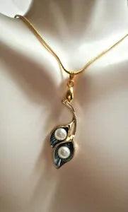 Gold tone Calla Lily pendant with  2white faux pearls & free chain