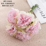Simulated sales of peony flowers for home decoration and wedding holding flowers