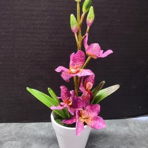 Cute little Artificial Vanda Orchid in white pot