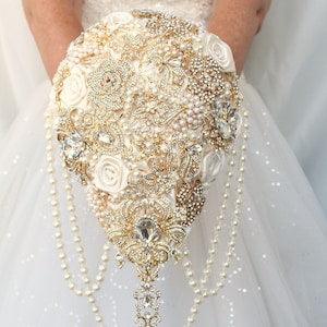 Gold ivory brooch bouquet. Cascade Old Hollywood bridal bouquet