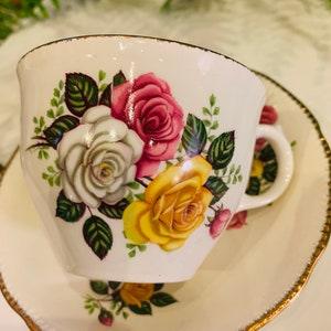 Vintage Royal Staffordshire June Bouquet teacup and saucer, 22kt gold trim