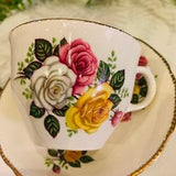 Vintage Royal Staffordshire June Bouquet teacup and saucer, 22kt gold trim