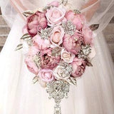 Dusty rose wedding bouquet. Blush pink bridal bouquet. Mauve and silver brooch bouquet. Quinceanera bouquet.