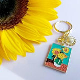 Sunflowers Vincent van Gogh artist's keyring. Van Gogh famous painting charm with sunflower charm on gold tone keychain.
