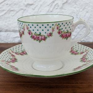 Tuscan China Teacup and Saucer, Plant, White with Green Polka Dots and Pink Roses, English Bone China, 1936-47