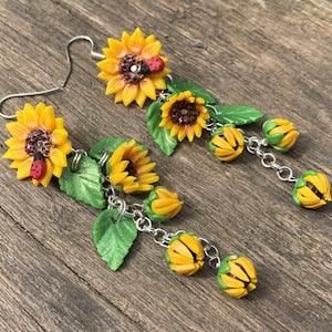 Sunflower and ladybird earrings, long, handmade, Sterling silver and clip ons available
