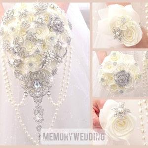 Ivory silver rose gold cascading bling and shiny brooch bouquet.