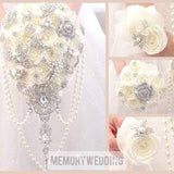 Ivory silver rose gold cascading bling and shiny brooch bouquet.