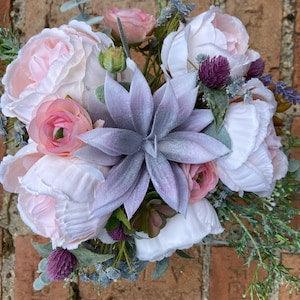 Pink rose and succulent bouquet