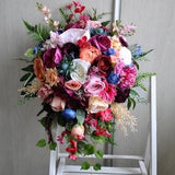 Hot pink peach bridal bouquet, Jewel tone wedding, Cascading bouquet