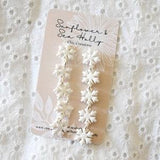 White Pearlescent Snowflake Dangling Polymer Clay Earrings