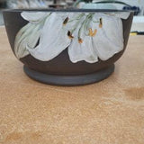 Planter with white lily