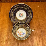 Aynsley Fine Bone China Cobalt Blue and Gold Filigree Teacup and Saucer With a Pink Rose Bouquet of Flowers in the Center