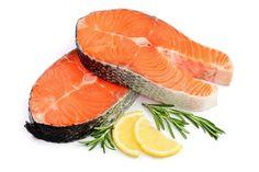 Slice of red fish salmon with lemon and rosemary isolated on white background Flower Delivery