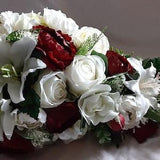 Cascade bridal wedding bouquet burgundy and light ivory roses lilies