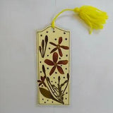 A Bookmark made of Beautiful Natural Dried Flowers and Dried Leaves.