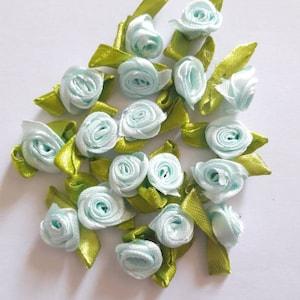 20 small sky blue satin roses +- 2 cm