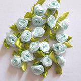 20 small sky blue satin roses +- 2 cm